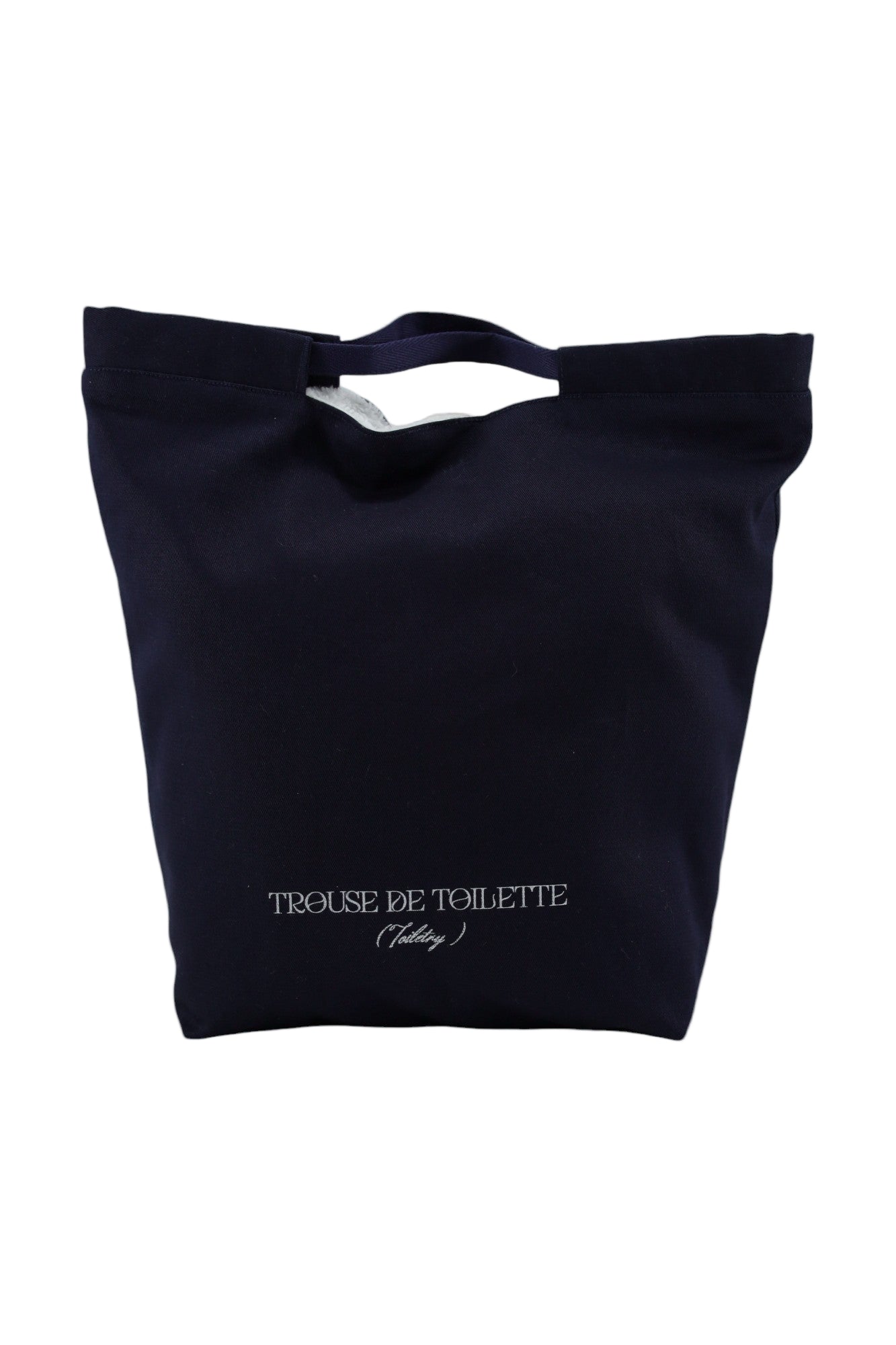 Cette trousse de toilette garde vos produits bien droit. Parfaite pour votre organisation de valise. Moonlac